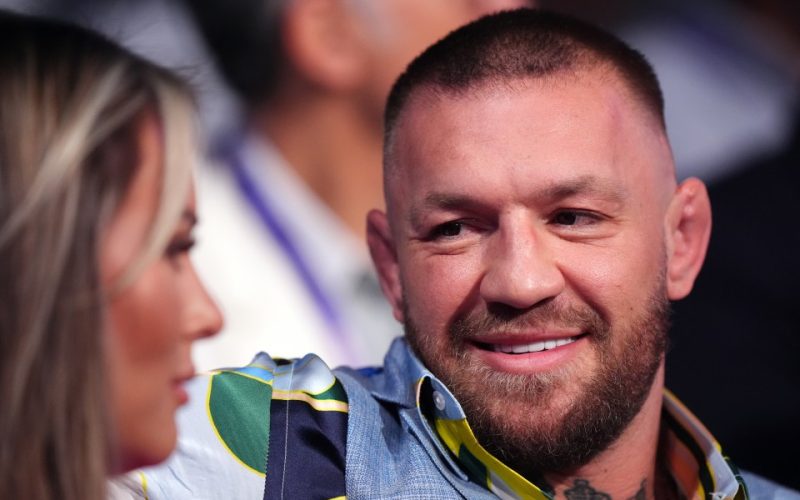 Joshua vs Dubois fans baffled as Conor McGregor turns up at Wembley with bizarre prop to watch fight ringside