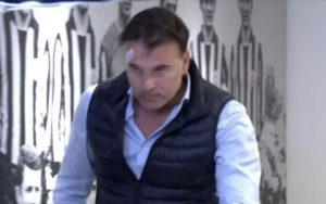 Football boss attends press conference with huge cuts on face after raging fans smash window following 4-0 derby loss