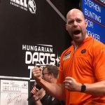 Watch darts star hit incredible 9-darter for first time ever after struggles COUNTING against Englishman Stephen Bunting