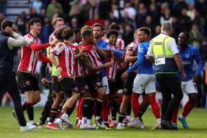 Sheffield United stars held back as Championship clash with Portsmouth descends into brawl at full-time whistle