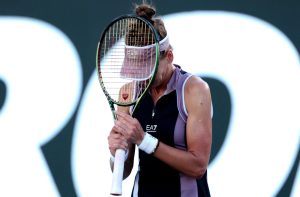 Watch horror moment furious tennis star smashes her head with her racket multiple times after ‘choking’ in major upset