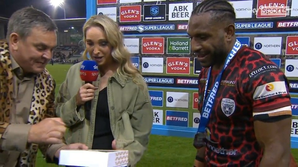 Watch moment Super League owner gatecrashes interview live on TV to give stunned Sky Sports reporter a PIE