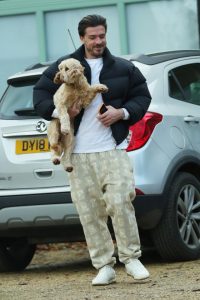 Jack Grealish beams as he and Sasha Attwood are seen out for the first time with baby Mila and dog Skye