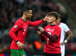 Cristiano Ronaldo branded ‘ultimate selfie enabler’ after incredible reaction to pitch invader at Portugal game