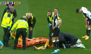 Danny Welbeck stretchered off and left needing oxygen after suffering back injury in Brighton’s clash at Newcastle