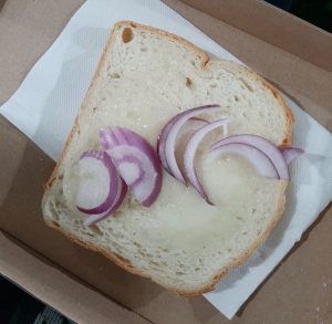 Repulsed fans say ‘it’s still overpriced’ as 85p lard bread with onion at Europa League side goes viral