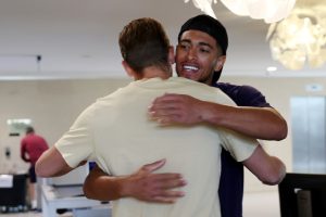 Bellingham and Kane share hug as beaming England stars arrive at St George’s Park ahead of Nations League double-header