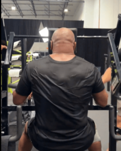 Mike Tyson, 58, shows off gruelling NECK exercises as he fires X-rated warning to Jake Paul