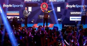 Distracted Mike De Decker almost forgets trophy after stunning World Grand Prix Darts final win over Luke Humphries