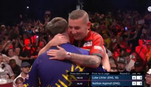 Luke Littler sets new TOURNAMENT RECORD as shocked Nathan Aspinall throws darts on the floor after blistering win