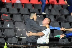 Shock moment Argentina legend steps in to stop chaos in Boca Juniors clash after riot police deployed tear gas