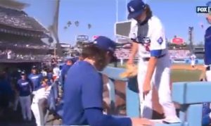 Watch moment SNAKE invades LA Dodgers’ dugout during game against New York Mets forcing pitcher to abruptly stop