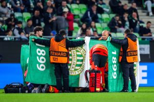 Medics rush to help and cover Nice star Sofiane Diop after terrifying injury in Europa League clash with Ferencvaros