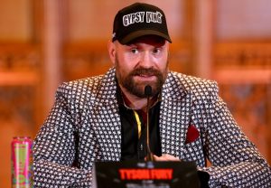 Tyson Fury sends X-rated message to Oleksandr Usyk with subtle detail in suit he wore to press conference