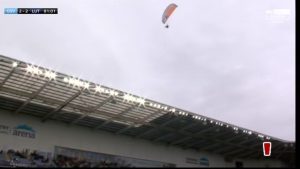 Championship clash temporarily suspended after bizarre moment man flies over stadium