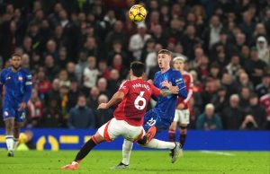 Fans stunned as Martinez escapes red card for ‘brutal attack’ on Cole Palmer after knee-high lunge in Man Utd vs Chelsea