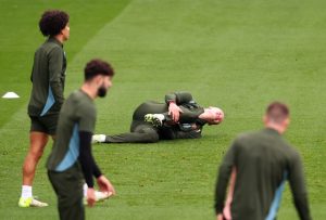 Erling Haaland suffers injury scare in Man City training just hours before Sporting clash and left writhing in pain