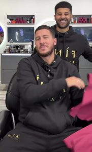 Chelsea fans LOVE Eden Hazard’s reaction as Blues legend is pranked by barber with Tottenham shirt