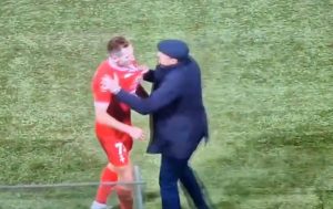 Shock moment former EFL boss grabs his own player and furiously shoves him after receiving red card