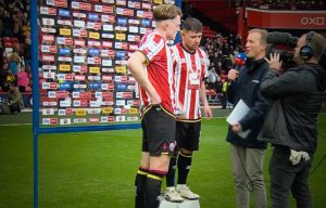 Sky Sports forced to get a stool for Sheff Utd star in live TV interview and he still can’t reach 6ft 7in team-mate