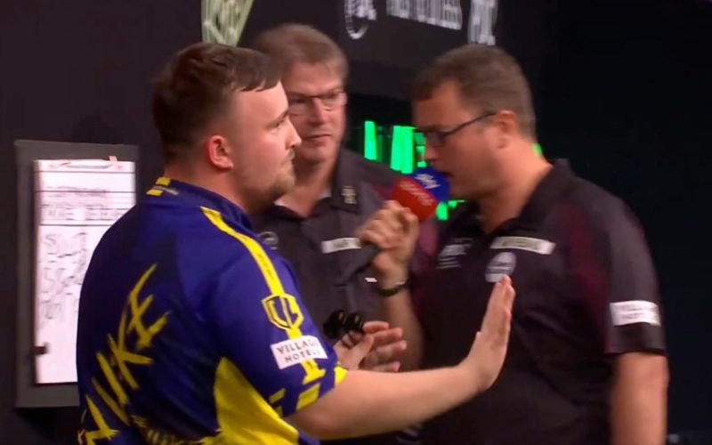 Luke Littler refuses to celebrate after surviving match dart to edge out Mike De Decker 10-9 in Grand Slam of Darts epic