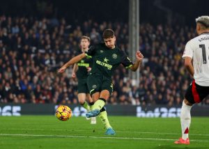 Fulham 2 Brentford 1: Wilson climbs off bench to send home fans delirious with two injury-time goals in thrilling climax