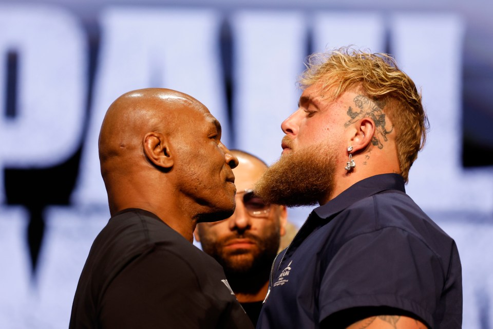 Mike Tyson tells Jake Paul ‘I’ll feed it to my falcon’ after being presented with bizarre gift in pre-fight face-off