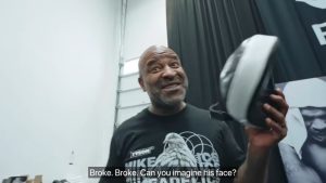 ‘Can you imagine Jake Paul’s face,’ says Mike Tyson trainer as he BREAKS boxing pad with brutal power in training video