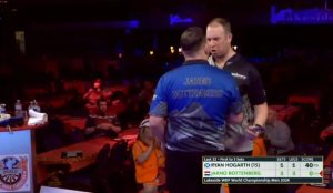 Darts World Championship match turns ugly as star ‘pushes’ rival and fans say ‘they’re about to have a scrap’