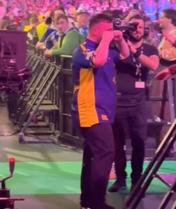 Luke Littler hilariously trolls HIMSELF in front of family before going in for a hug after reaching PDC Worlds last 16