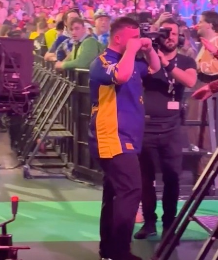 Luke Littler hilariously trolls HIMSELF in front of family before going in for a hug after reaching PDC Worlds last 16