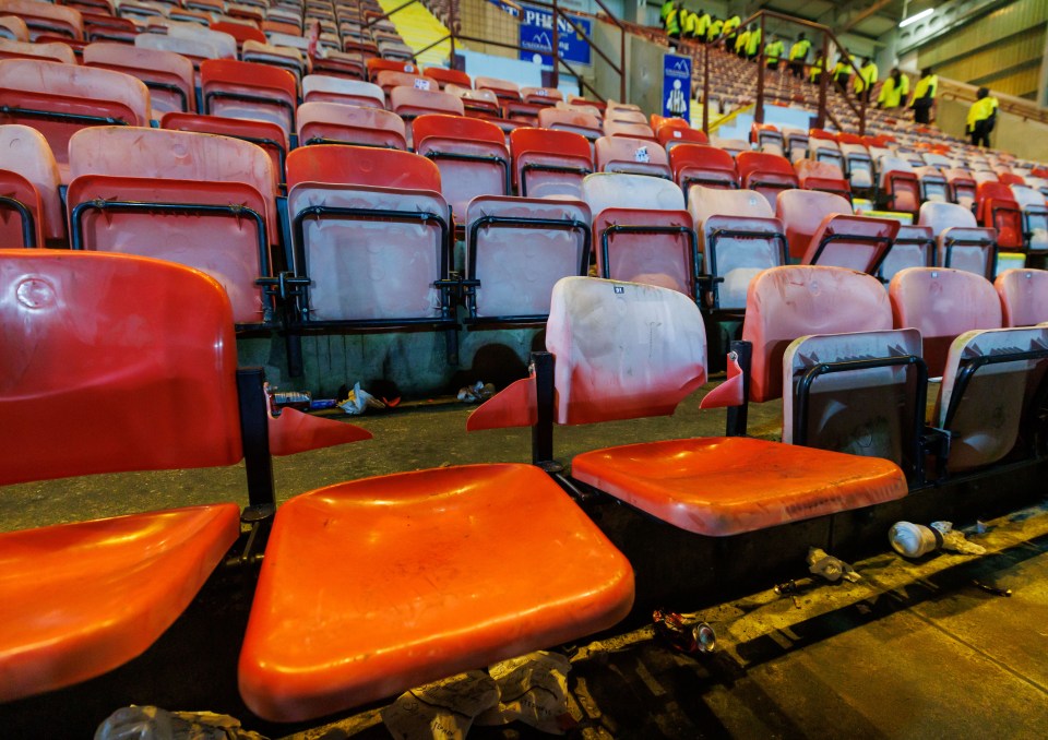 Dunfermline v Falkirk derby descends into chaos as seats damaged and fans arrested after ‘missiles aimed at players’