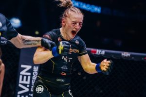 MMA star breaks down in tears after winning world title… despite sport being ILLEGAL in her country