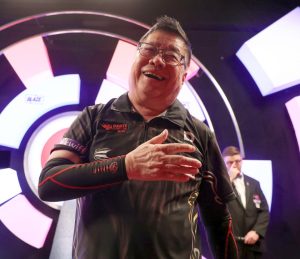 Heartbreak for legend Paul Lim who fails to make history at the age of 70 in final of the WDF World Darts Championship