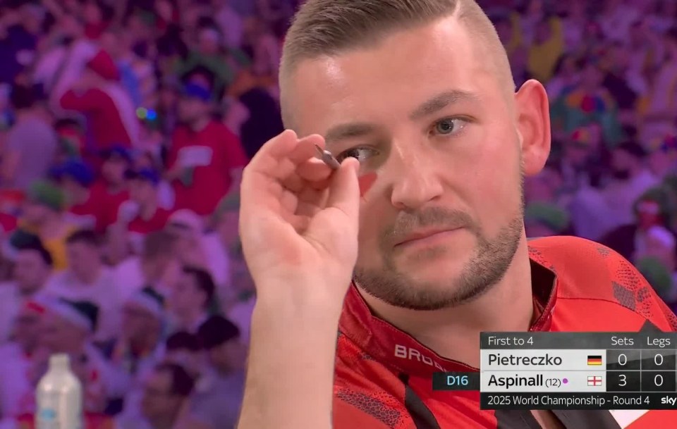 Nathan Aspinall ‘tries to take his dart back’ after missing nine-darter in rarely-seen moment at World Championship