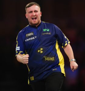 Luke Littler overcomes sticky start to see off plucky veteran Ian White and reach PDC World Championships last 16