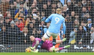 Everton keeper Jordan Pickford’s cheat sheet revealed on WATER BOTTLE as he saves Haaland’s penalty