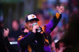 Ed Sheeran downs drink and gives Ally Pally crowd the middle finger after Ipswich taunt at PDC World Darts Championship