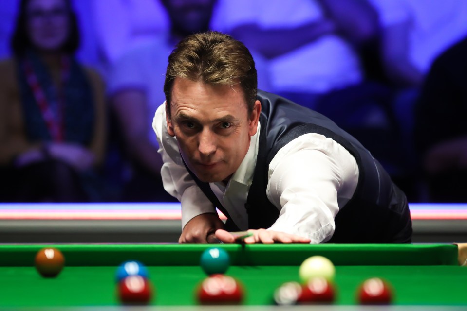 Former world champion, 55, wins dramatic blue-ball shootout to take home Snooker 900 title