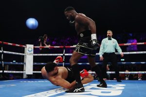 Lawrence Okolie secures brutal first-round stoppage win in first heavyweight fight after bulking on FOUR STONE