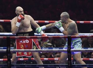 Tyson Fury had ‘bad distraction’ Anthony Joshua fight in his head before Usyk defeat – but it screams of WWE cash-grab