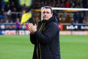 Hilarious moment Burton boss Gary Bowyer falls flat on his back kicking the ball away during Northampton defeat