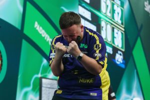 Luke Littler wears luxury £5,500 TAG Heuer watch during World Darts Championship demolition of Michael van Gerwen