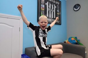 Young Newcastle fan, 9, caught skipping school after being caught on camera at Carabao Cup