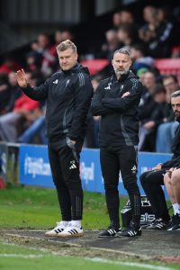 Why is Ryan Giggs on the touchline for Salford City in their FA Cup clash at Man City?